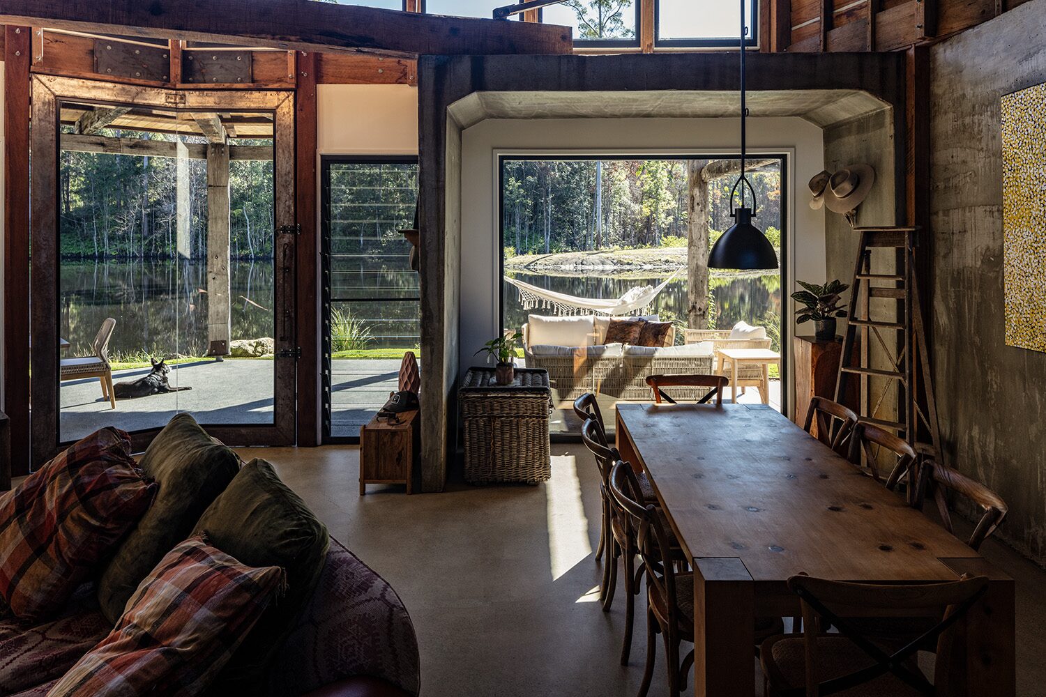 Arrowwood Acres — bedroom, concrete pillar and artwork