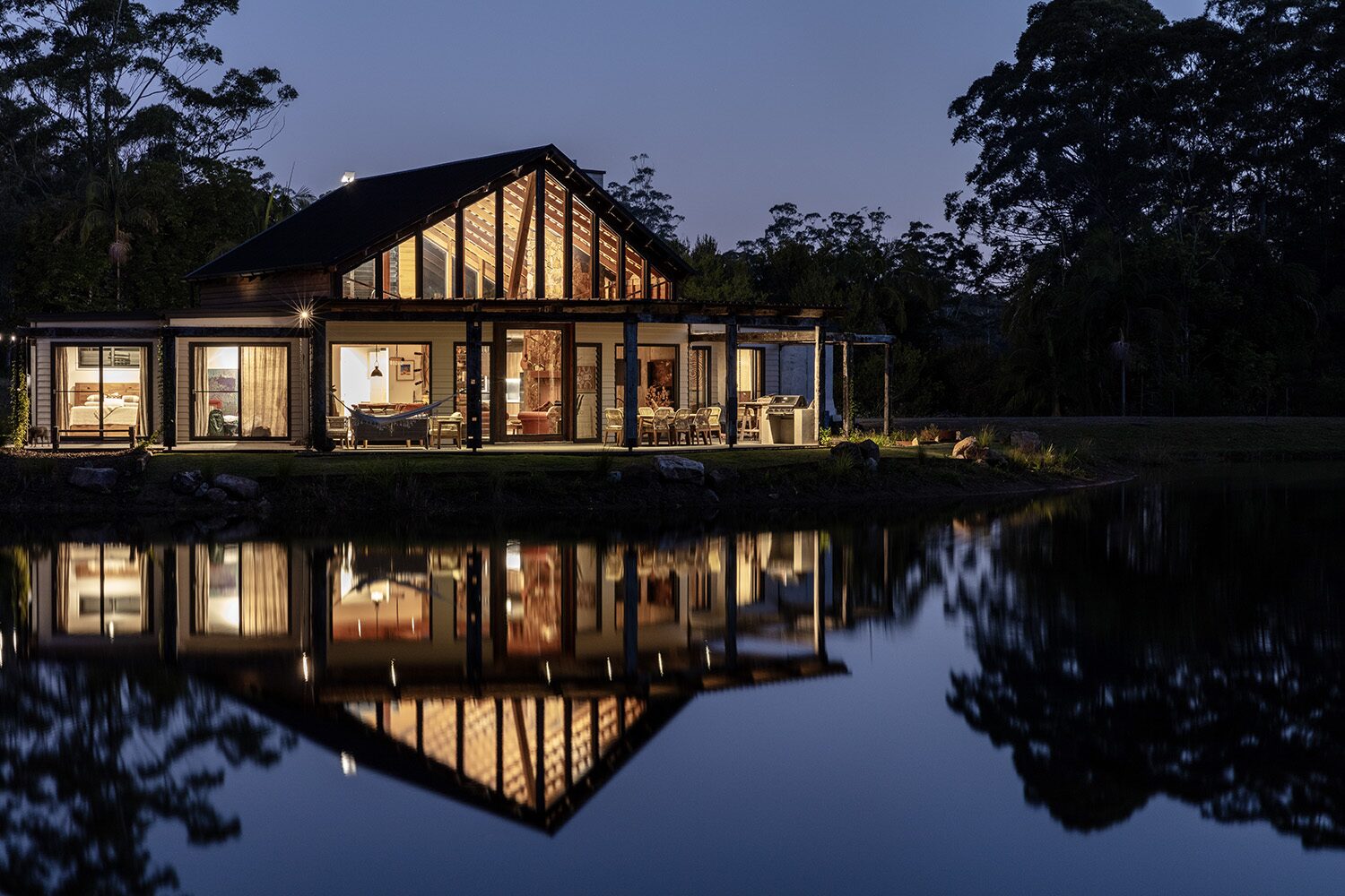 Arrowwood Acres — dusk facade and dam reflection