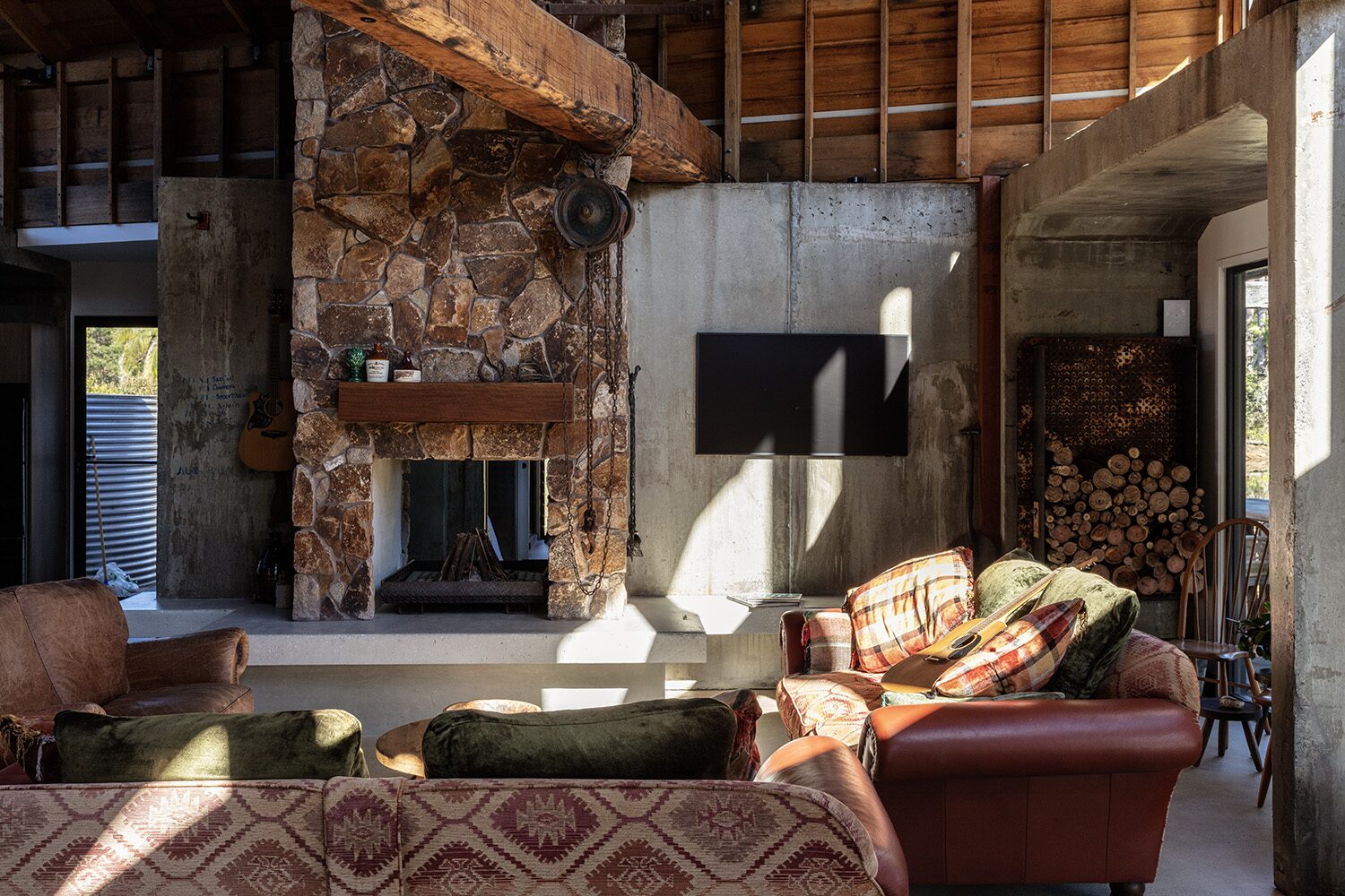 Arrowwood Acres — living room, fireplace and firewood store