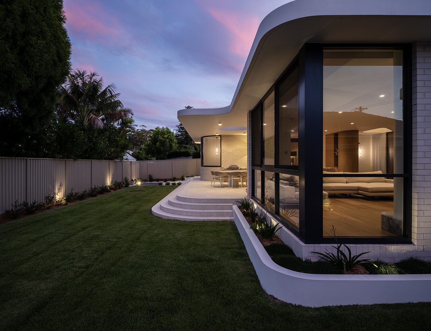 Miranda — dusk exterior, rear
