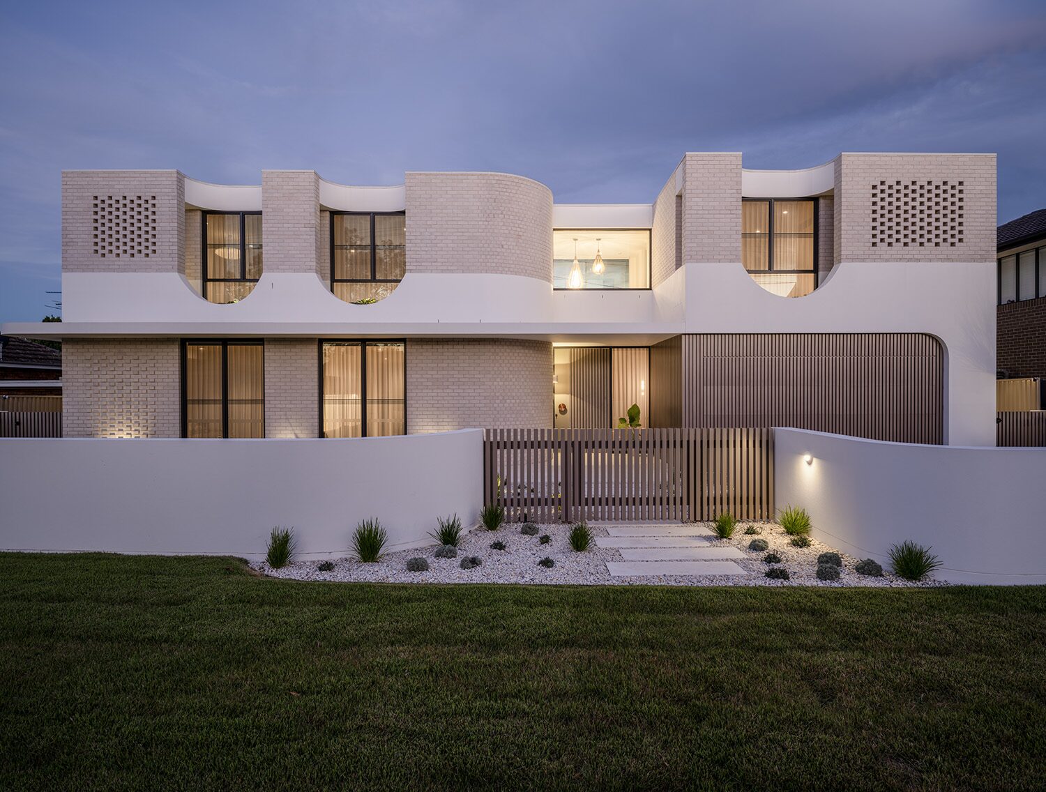 Miranda — dusk exterior, front facade