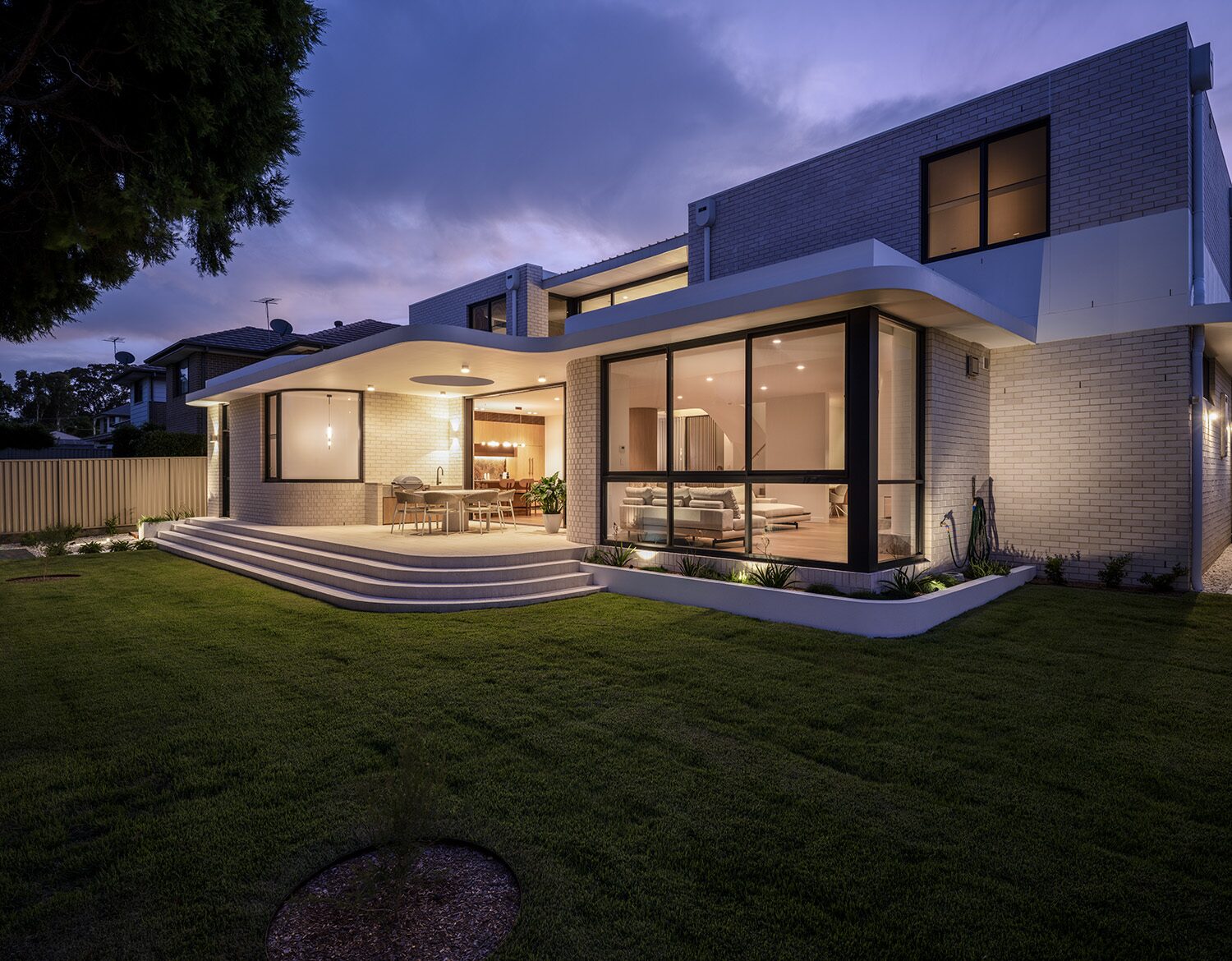 Miranda — dusk exterior, rear terrace