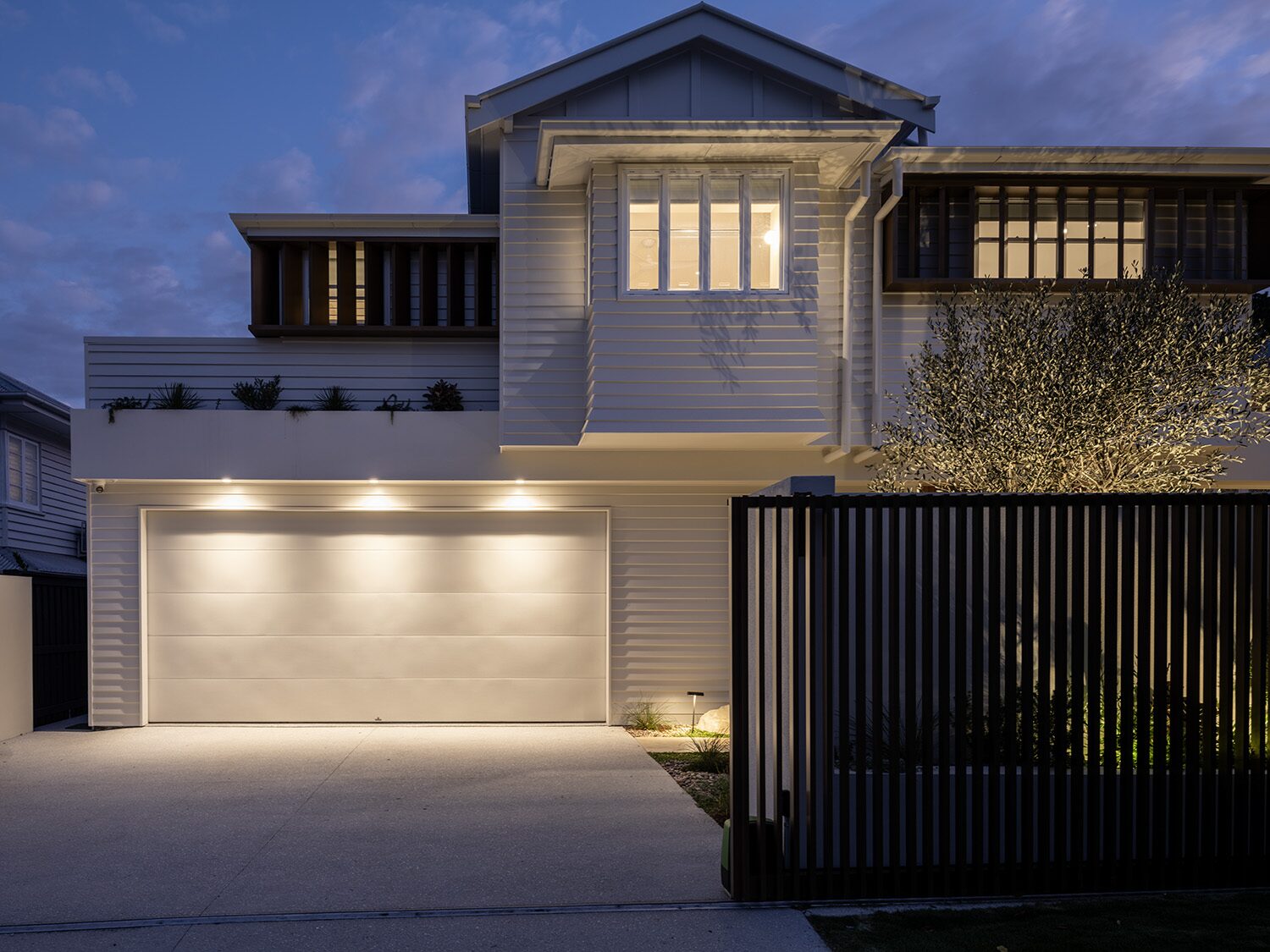 Pelham — garage facade at dusk