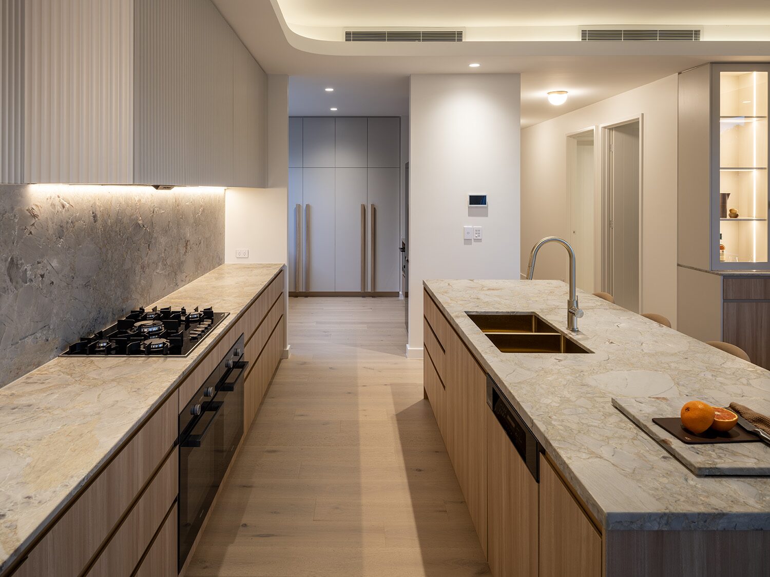 Pelham — kitchen, wide view at dusk