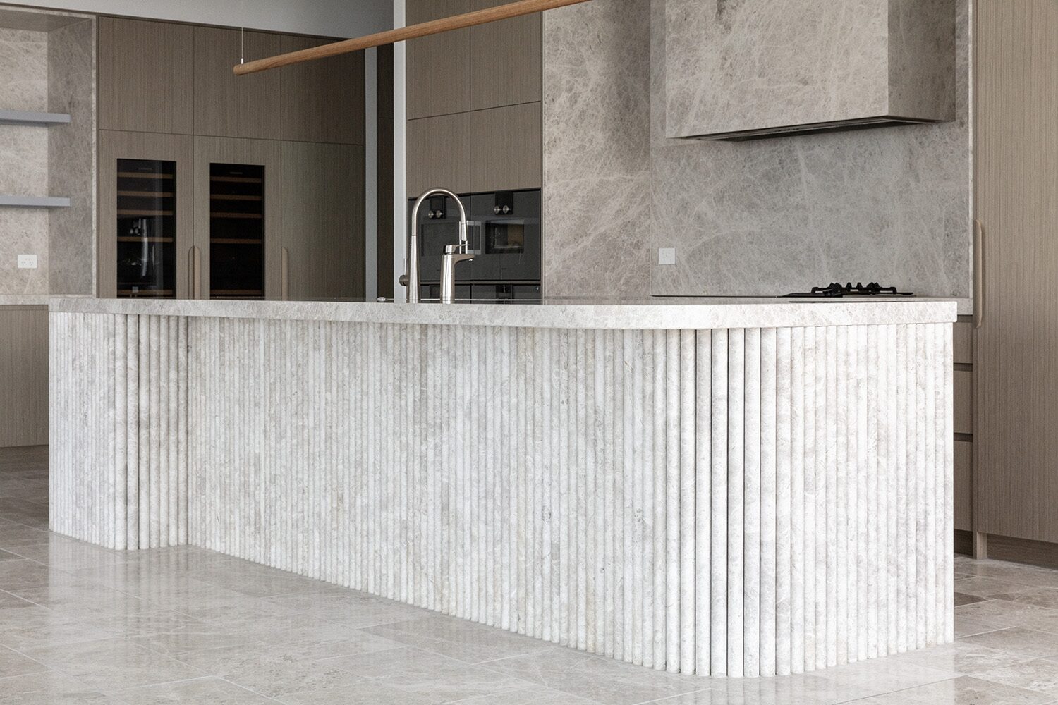 Rivello Residences — kitchen, fluted island detail