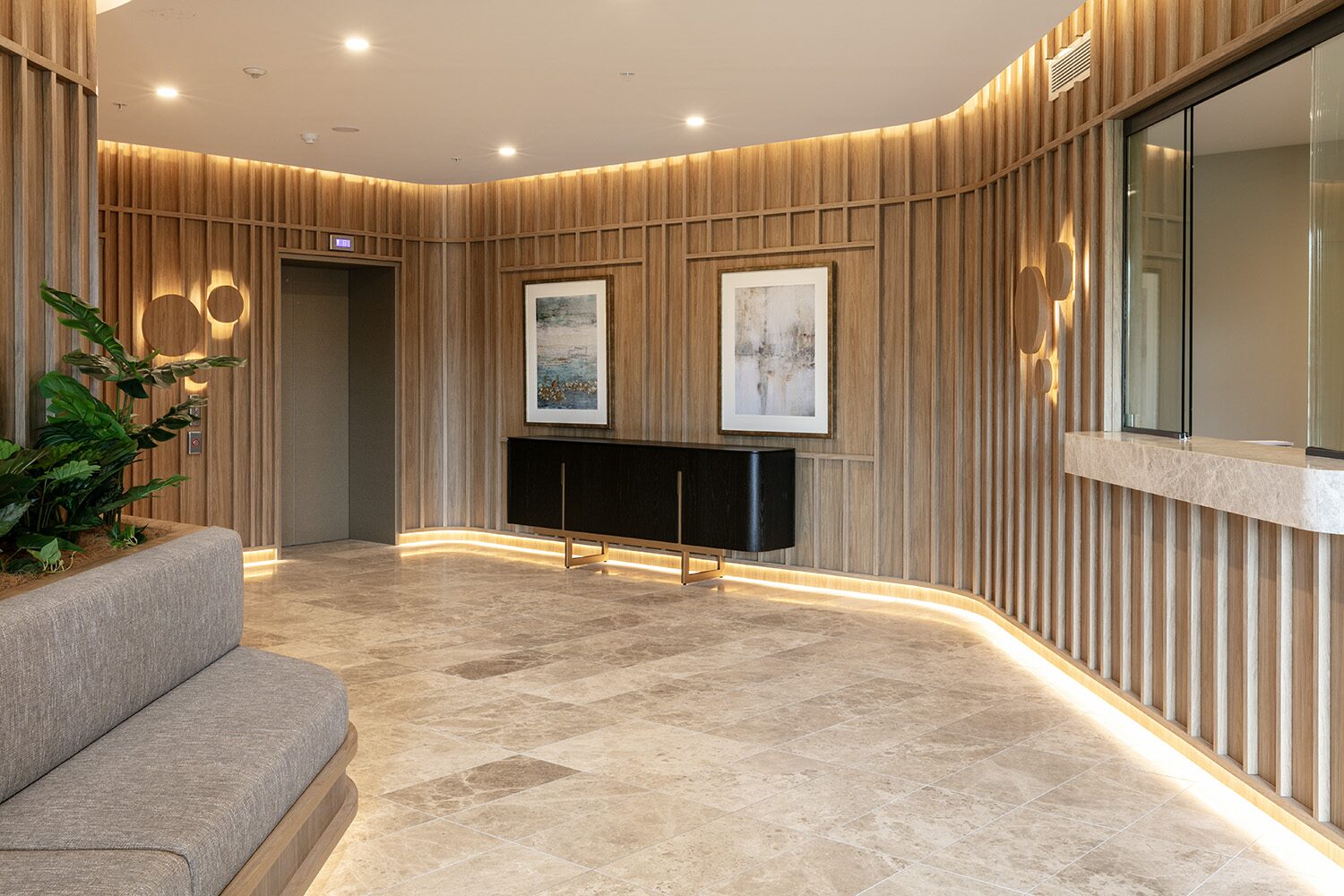 Rivello Residences — lobby, artwork and sideboard