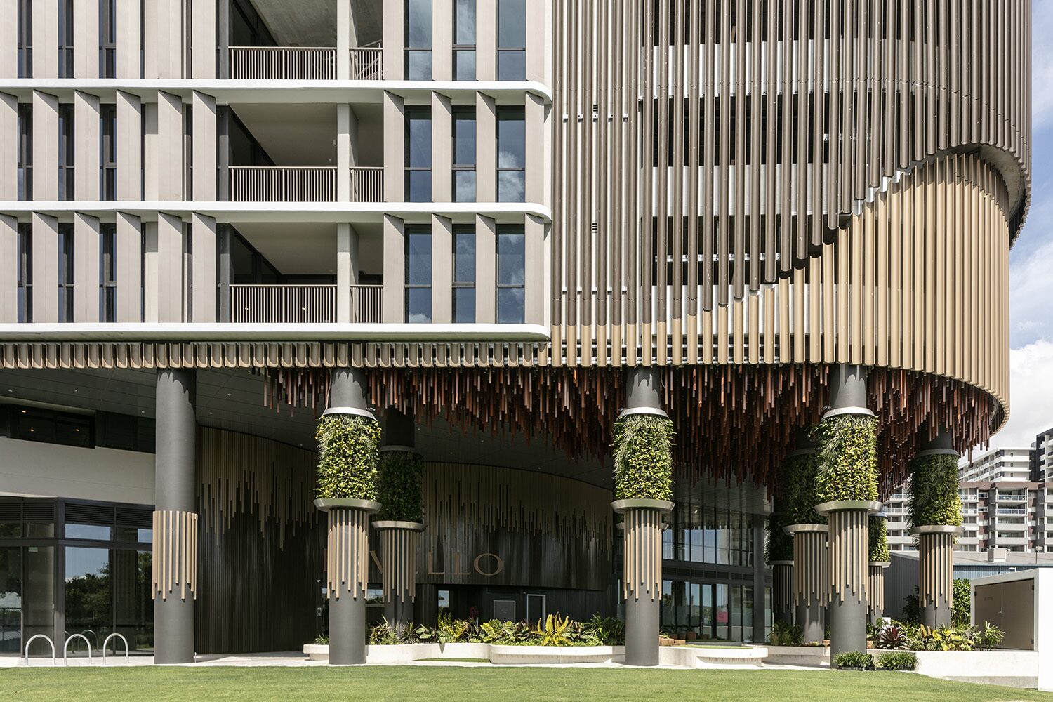 Rivello Residences — podium, undulating timber canopy and greenery