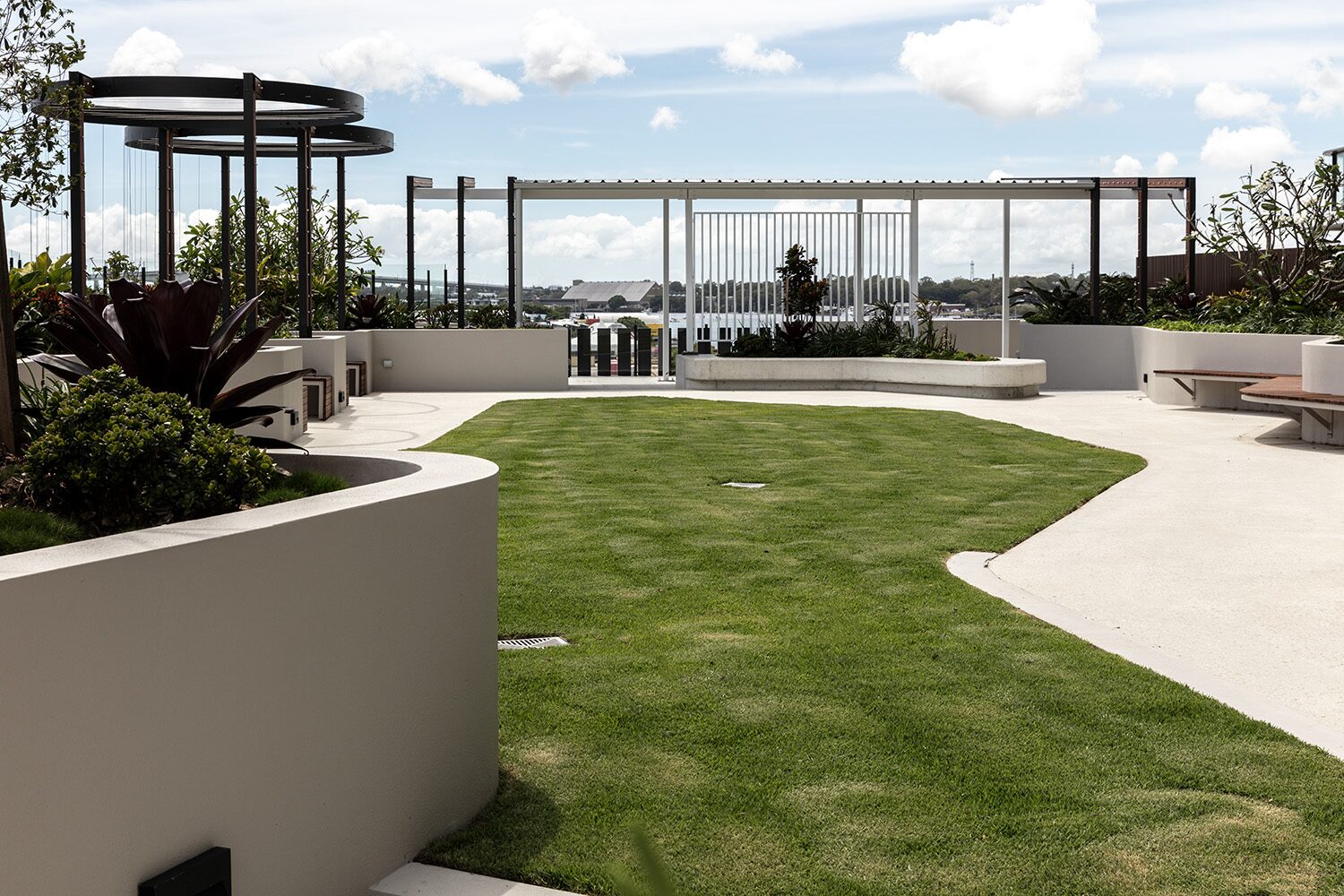 Rivello Residences — rooftop communal garden terrace and pergola