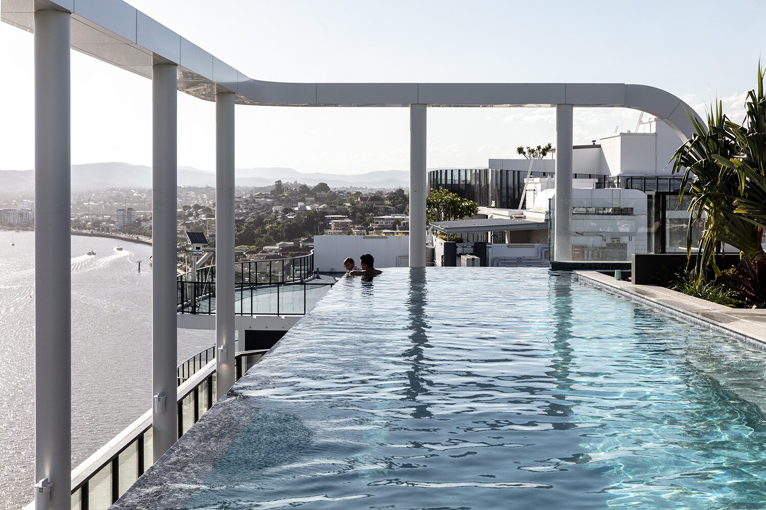 Rivello Residences — rooftop infinity pool, river view