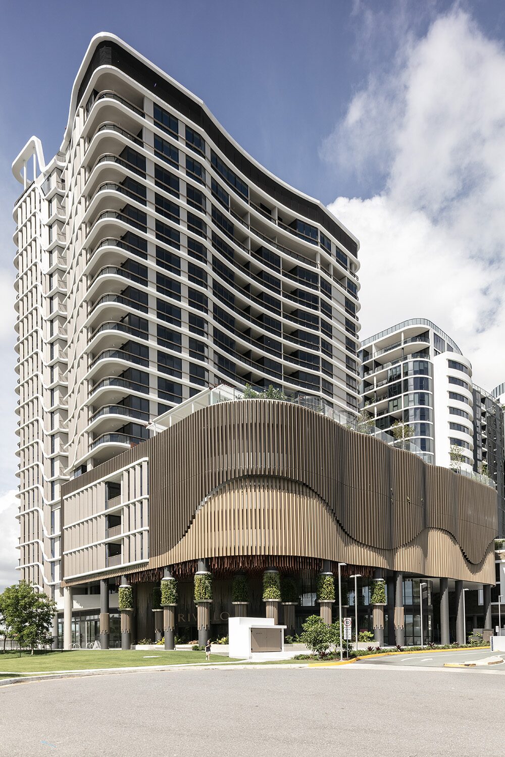 Rivello Residences — tower exterior, curved balcony facade