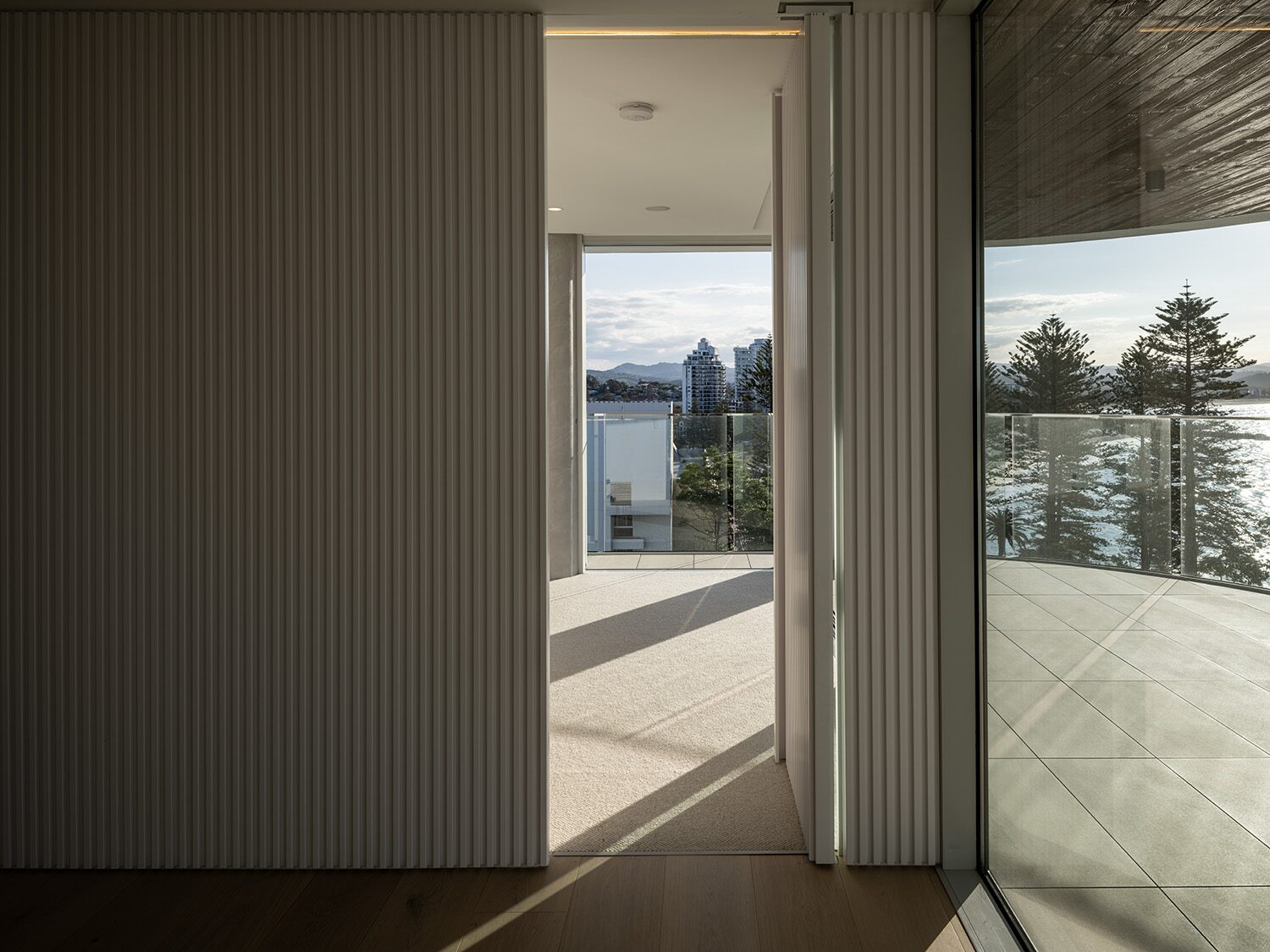 Rockpool — balcony doorway, coastal view