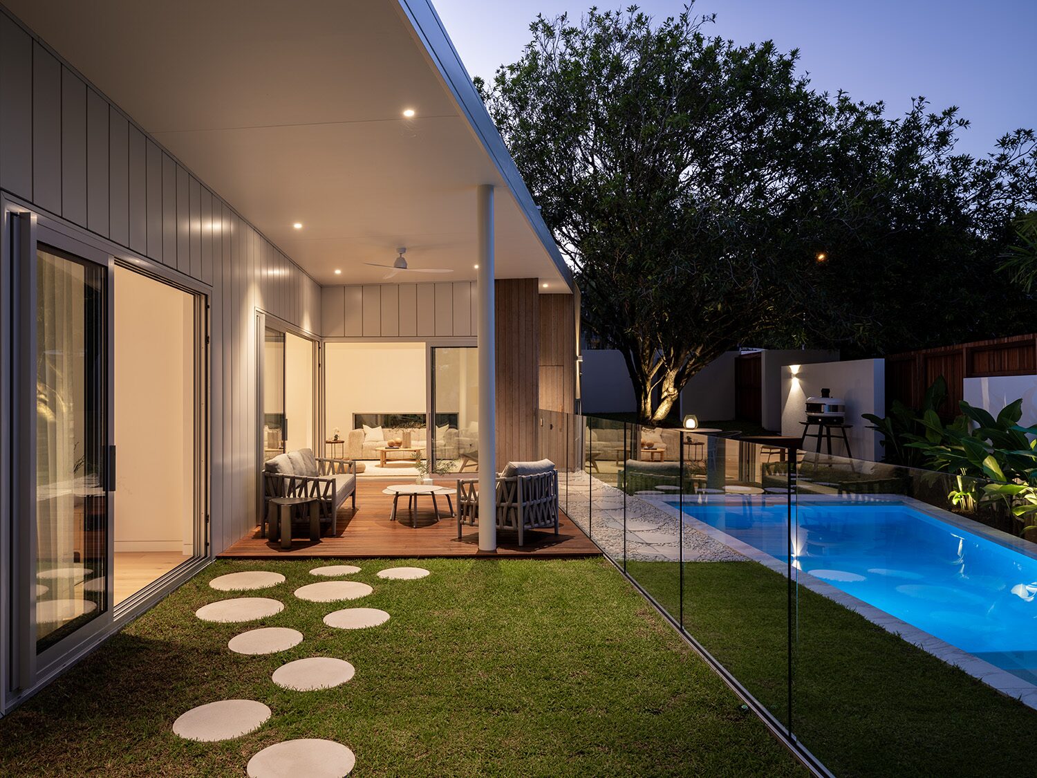 Tarina — pool terrace at dusk, alfresco lounge