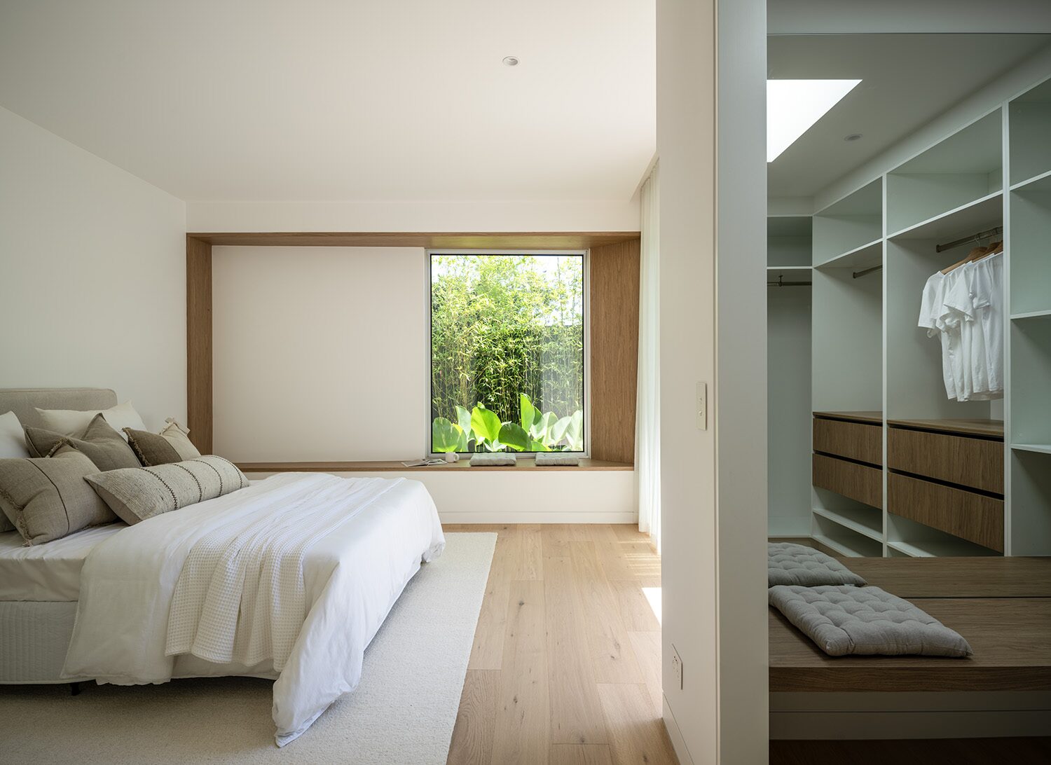 Tarina — bedroom, garden window and walk-in robe beyond