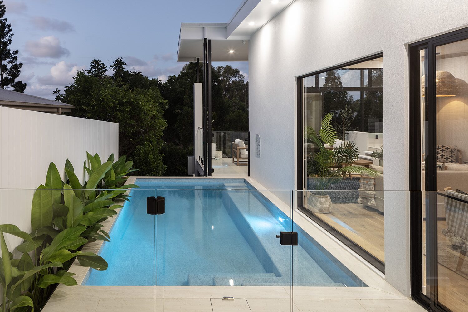 Vantage — dusk, pool and facade