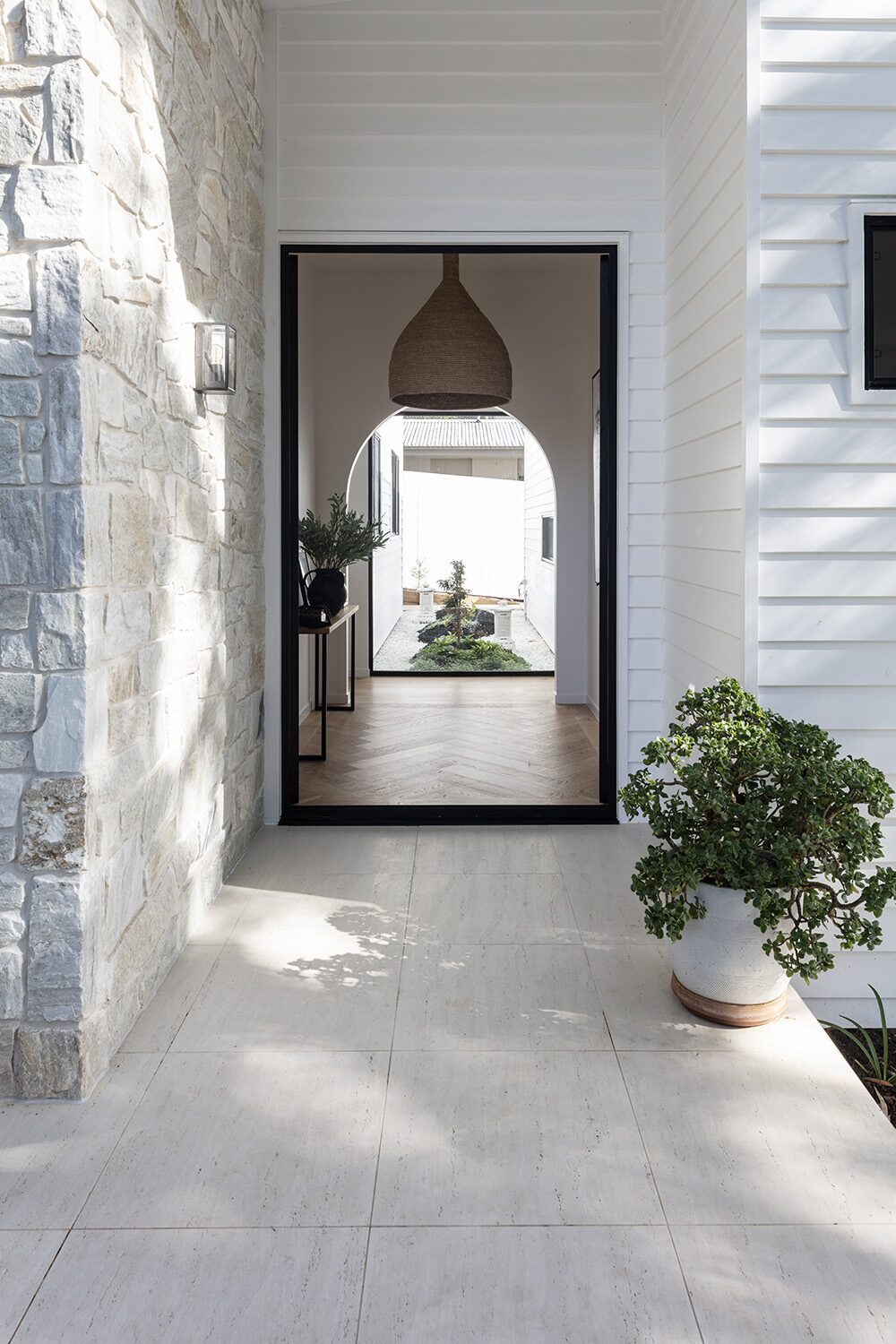 Vantage — entrance arch and courtyard view